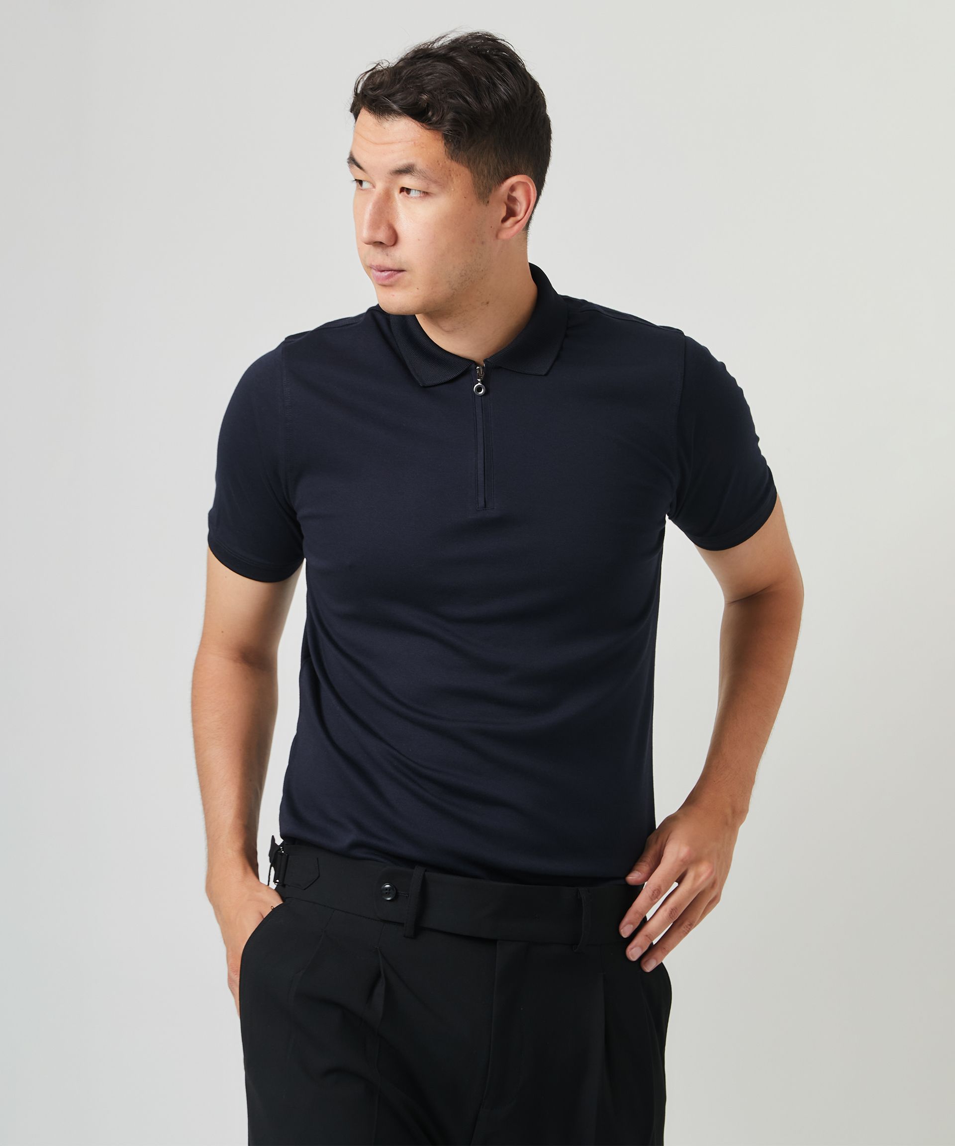 Поло глубокого темно-синего цвета с легким меланжевым эффектом